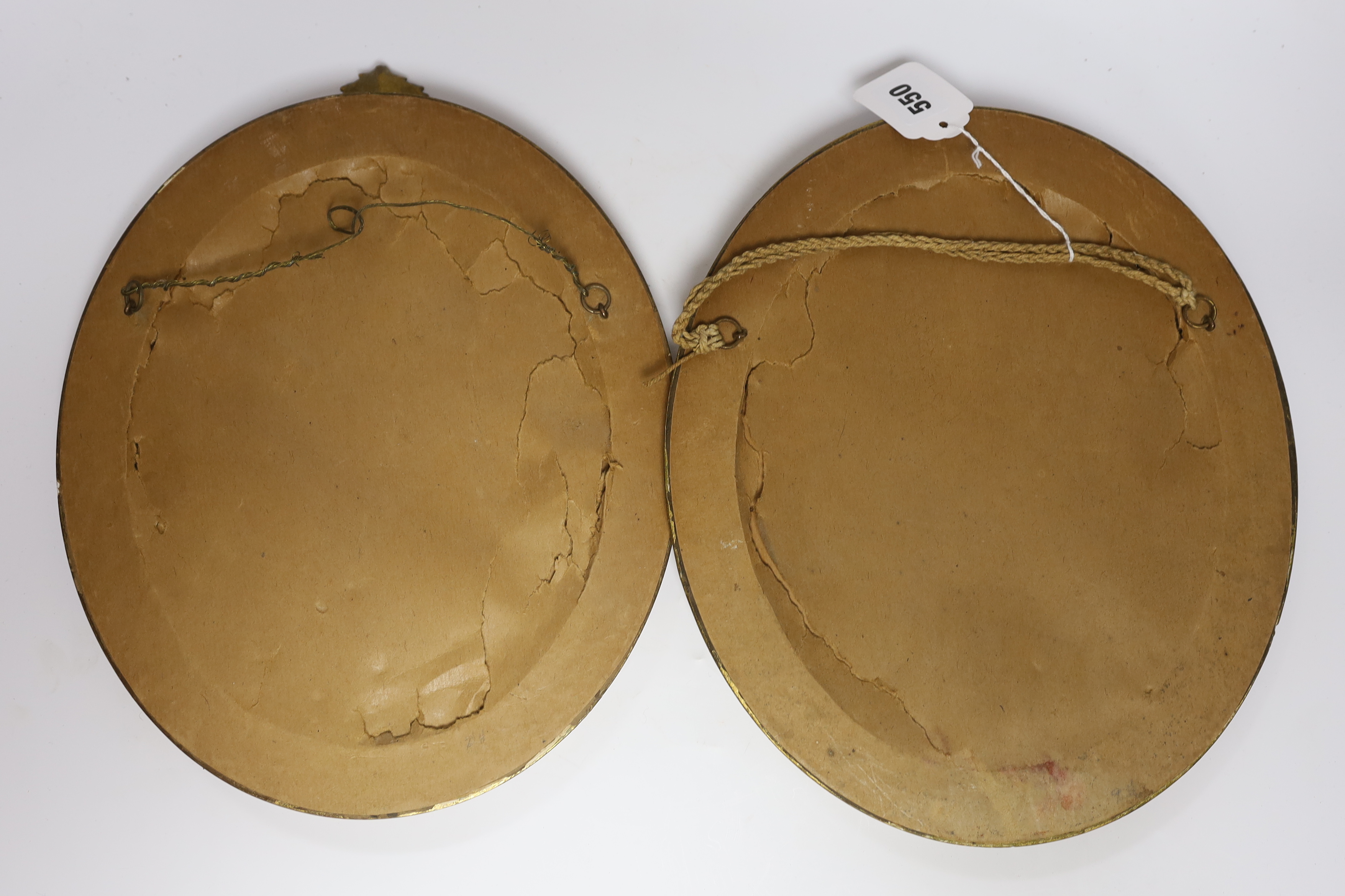 A pair of small oval giltwood and composition wall mirrors, 35cm high